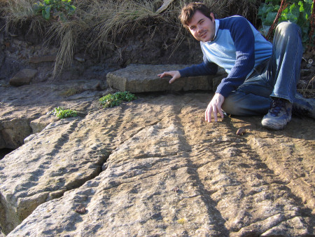 Roy Shepherd with Arthropleura trackways left in the prehistoric sediment