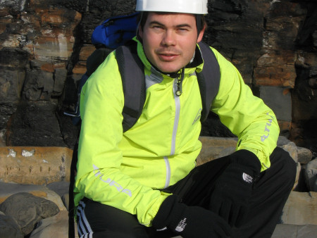 Roy Shepherd wearing a high visibility jacket for fossil hunting